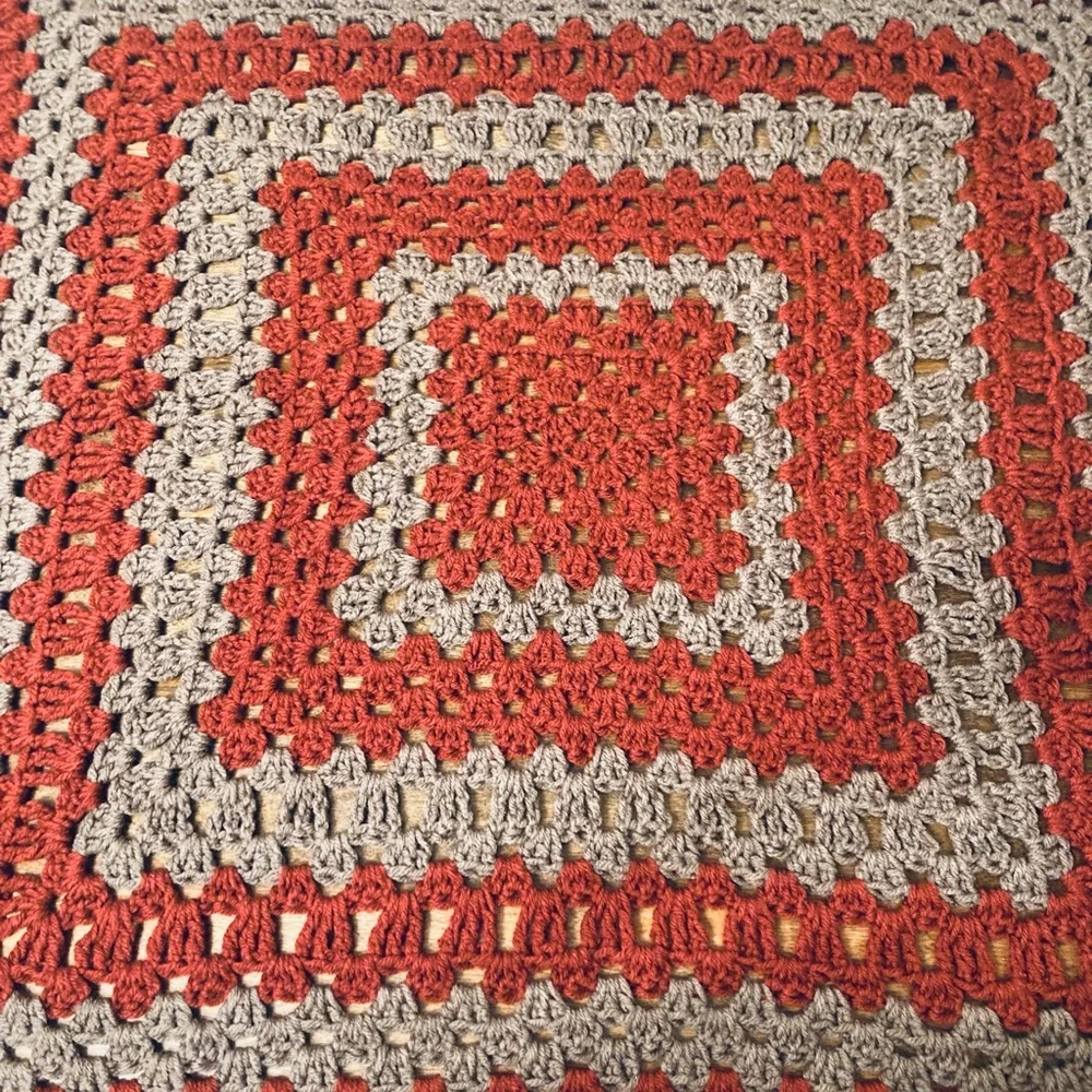Vintage hand made retro burnt orange and grey knitted crochet granny table cover